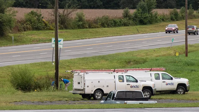 North Central Telephone Cooperative Corporation (NCTC), Install and Repair Technicians Adam Milby and Jason Russell repair a fiberoptic cable that leads undergound to a nearby business customer in Lafayette, Tennessee, on Sept 27, 2018. Most of their fiberoptic network is buried underground better p. A broadband guide to USAC and FCC rural funding